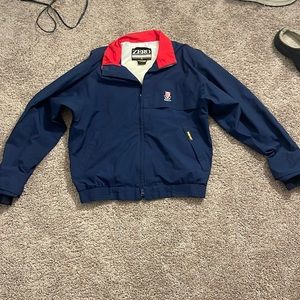 Gore-Tex style jacket, navy blue with red collar, full zip